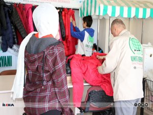 Mardin Umut Kervanı, ihtiyaç sahibi çocuklara bot ve mont dağıttı