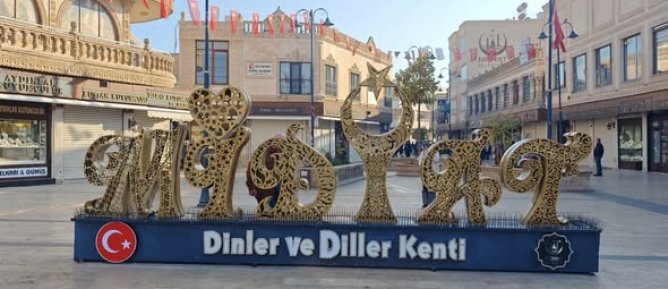 MİDYAT YAZISI YERİNE TAKILDI