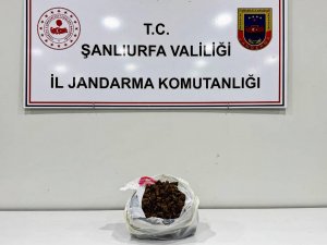 Şanlıurfada durdurulan araçta 1 kilo skunk ele geçirildi