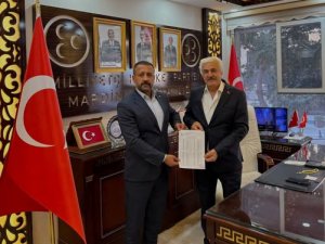MİDYAT MHP İLÇE BAŞKANI ADİL ACAR MAZBATASINI TESLİM ALDI